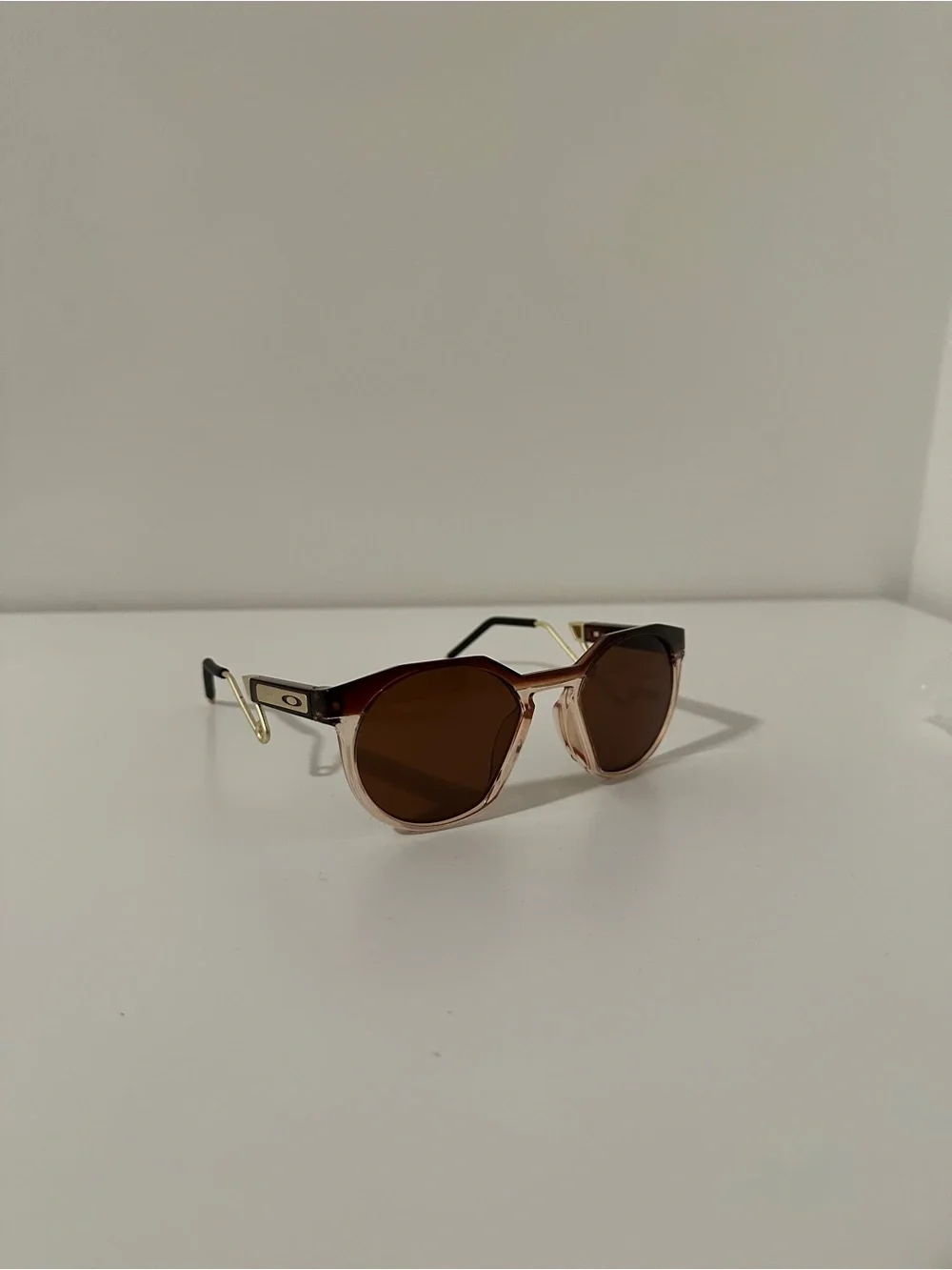 Oakley Men’s Brown Lensed Sunglasses with Gold Temple Accents
